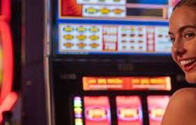 Blueprint Gaming slot interface showing five-reel layout with bonus feature trigger and bet controls